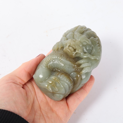 309 - A Chinese relief carved jade dragon design boulder, length 9cm