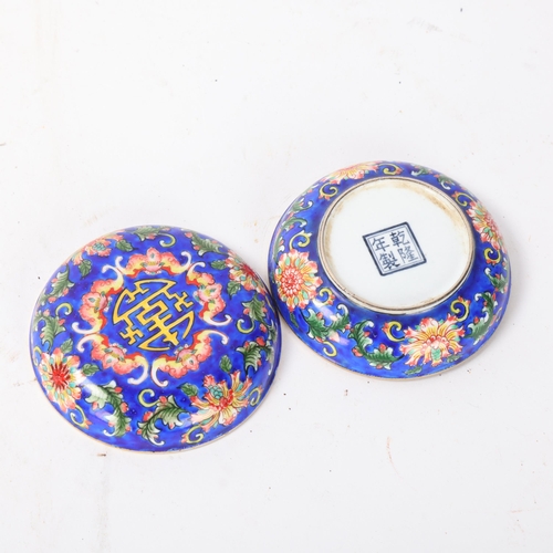 311 - A small Chinese circular enamel box, decorated with bats, diameter 7cm