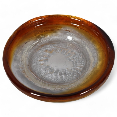 591 - PERTTI SANTALAHTI for Humppila, Finland, a clear and amber textured glass dish, unsigned, diameter 2... 