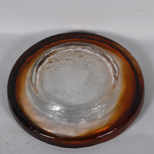 591 - PERTTI SANTALAHTI for Humppila, Finland, a clear and amber textured glass dish, unsigned, diameter 2... 