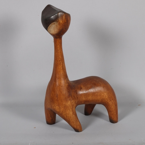 592 - A vintage carved wood modernist cat, unsigned, height 35cm