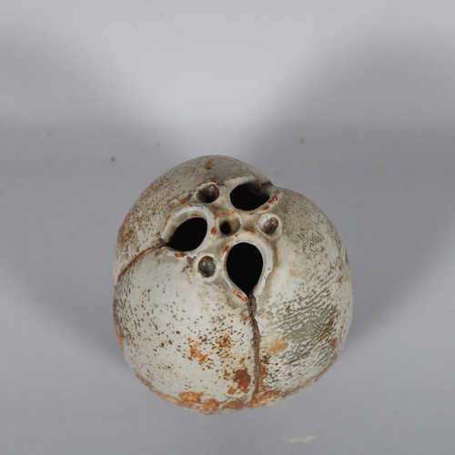 593 - ALAN WALLWORK (1931-2019), a small stoneware seed pod form vessel with iron staining, incised AW mar... 