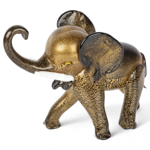 597 - Attributed to ERCOLE BAROVIER for Barovier & Toso Murano, Black pate de verre glass elephant with sl... 