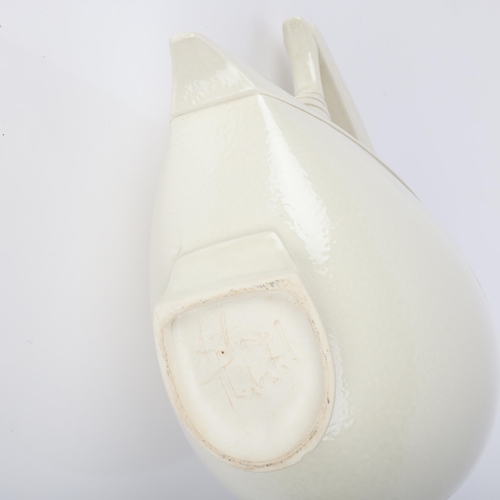 599 - ANTHONY THEAKSTON (b.1965), a slipcast soda glaze jug in bird form, signed to base,  height 23.5cm