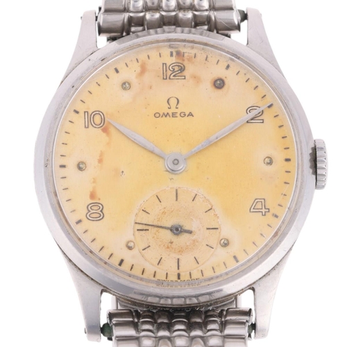 1010 - OMEGA - a Vintage stainless steel mechanical wristwatch, ref. 13322, circa 1947, silvered dial with ... 