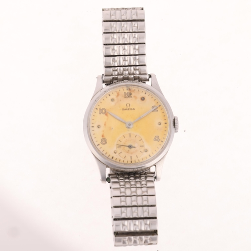 1010 - OMEGA - a Vintage stainless steel mechanical wristwatch, ref. 13322, circa 1947, silvered dial with ... 