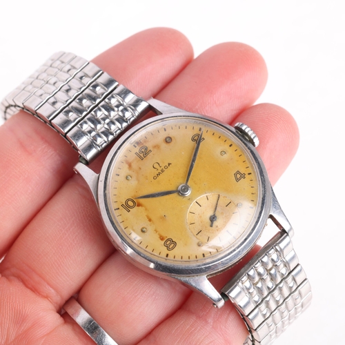 1010 - OMEGA - a Vintage stainless steel mechanical wristwatch, ref. 13322, circa 1947, silvered dial with ... 