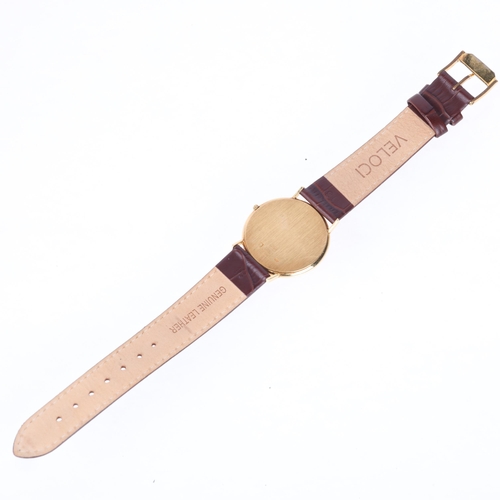 1013 - KUTCHINSKY - an 18ct gold 'Saudi Arabia Emblem' quartz wristwatch, maroon dial with gilt quarterly d... 