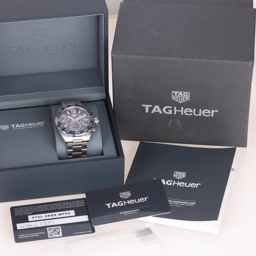 1015 - TAG HEUER - a stainless steel Formula 1 quartz chronograph calendar bracelet watch, ref. CAZ1014, bl... 