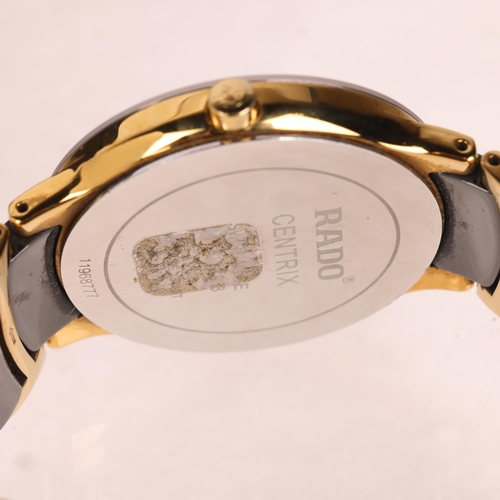 1021 - RADO - a gold plated black High-Tech ceramic Centrix DiaStar quartz calendar bracelet watch, ref. 11... 