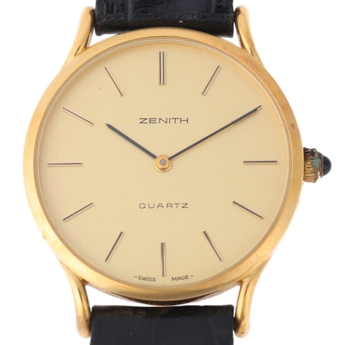 1028 - ZENITH - a gold plated stainless steel quartz wristwatch, ref. 27.0060.315, champagne dial with appl... 