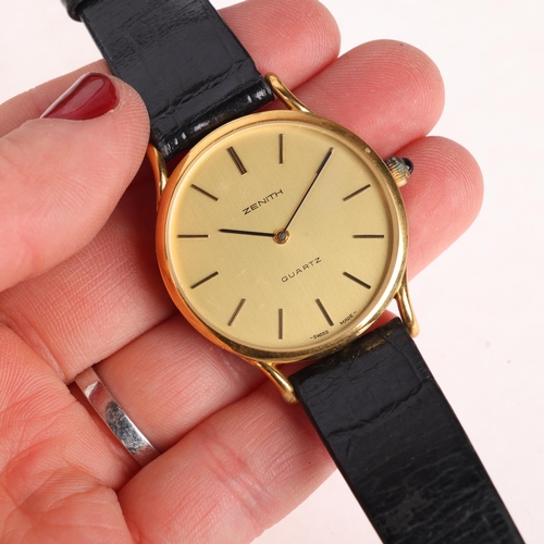 1028 - ZENITH - a gold plated stainless steel quartz wristwatch, ref. 27.0060.315, champagne dial with appl... 