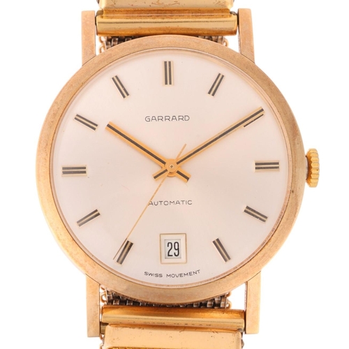 1033 - GARRARD - a Vintage 9ct gold automatic bracelet watch, circa 1970s, silvered dial with applied gilt ... 