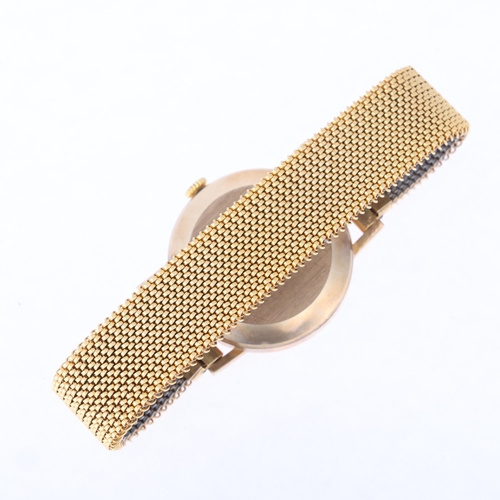 1033 - GARRARD - a Vintage 9ct gold automatic bracelet watch, circa 1970s, silvered dial with applied gilt ... 