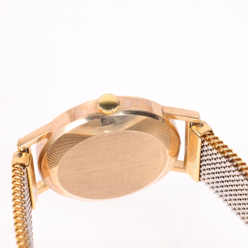 1033 - GARRARD - a Vintage 9ct gold automatic bracelet watch, circa 1970s, silvered dial with applied gilt ... 