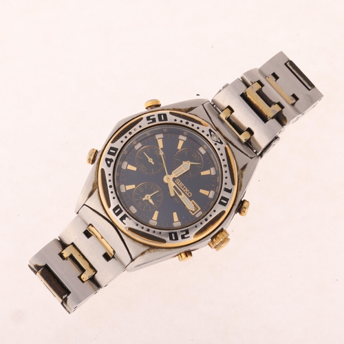 1035 - SEIKO - a gold plated stainless steel quartz chronograph bracelet watch, ref. 7T32-6L90, blue dial w... 