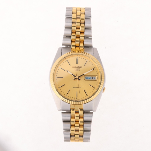 1036 - SEIKO 5 - a gold plated stainless steel automatic day/date bracelet watch, ref. 7009-3110, champagne... 