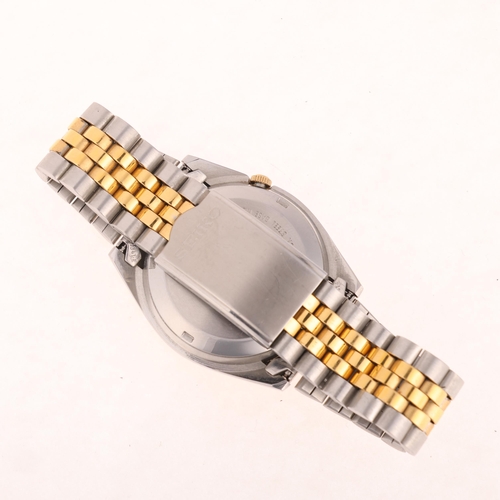 1036 - SEIKO 5 - a gold plated stainless steel automatic day/date bracelet watch, ref. 7009-3110, champagne... 