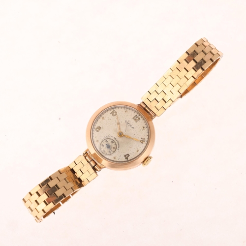 1040 - CYMA - a lady's 9ct gold mechanical bracelet watch, circa 1940s, silvered dial with gilt eighthly Ar... 