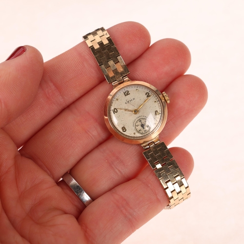 1040 - CYMA - a lady's 9ct gold mechanical bracelet watch, circa 1940s, silvered dial with gilt eighthly Ar... 