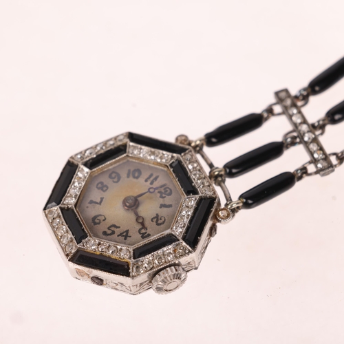 1049 - A lady's Art Deco platinum onyx and diamond mechanical nurse's lapel pendant watch, circa 1920s, oct... 