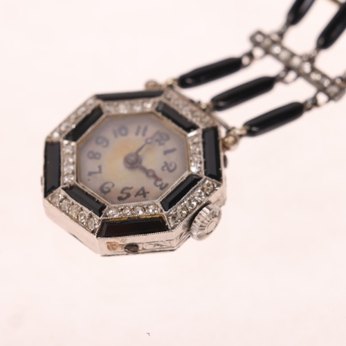 1049 - A lady's Art Deco platinum onyx and diamond mechanical nurse's lapel pendant watch, circa 1920s, oct... 