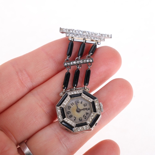 1049 - A lady's Art Deco platinum onyx and diamond mechanical nurse's lapel pendant watch, circa 1920s, oct... 