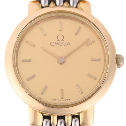 1050 - OMEGA - a lady's gold plated stainless steel De Ville quartz bracelet watch, champagne dial with app... 