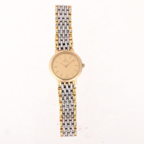 1050 - OMEGA - a lady's gold plated stainless steel De Ville quartz bracelet watch, champagne dial with app... 