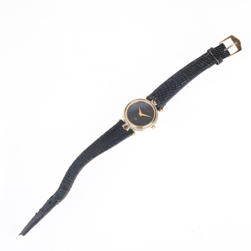 1051 - GUCCI - a lady's gold plated stainless steel 4500L quartz wristwatch, black dial with gilt dauphine ... 