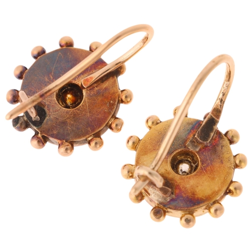 1107 - A pair of Victorian Etruscan Revival 18ct gold diamond earrings, each centrally star set with old-cu... 