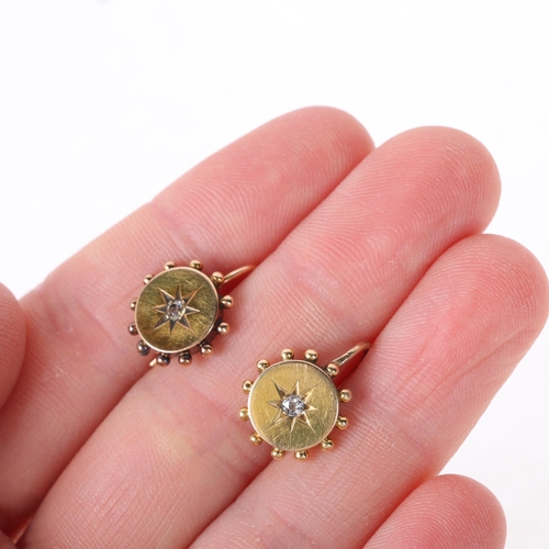 1107 - A pair of Victorian Etruscan Revival 18ct gold diamond earrings, each centrally star set with old-cu... 