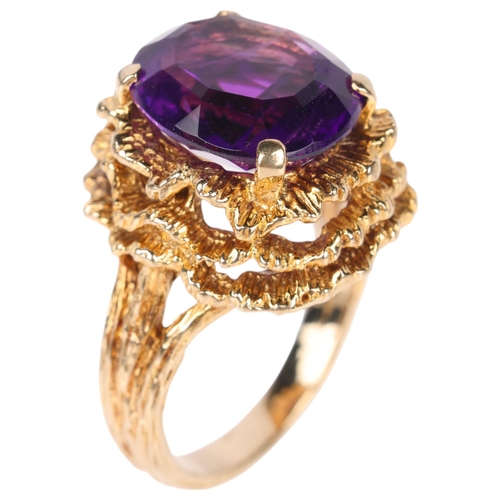 1127 - A Vintage 9ct gold single stone amethyst abstract ring, maker HB, London 1967, set with oval-cut ame... 