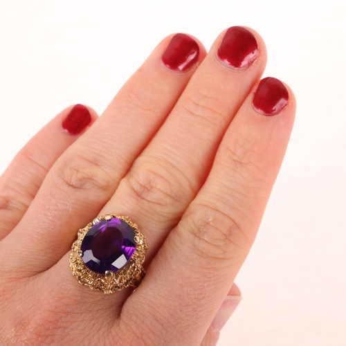 1127 - A Vintage 9ct gold single stone amethyst abstract ring, maker HB, London 1967, set with oval-cut ame... 