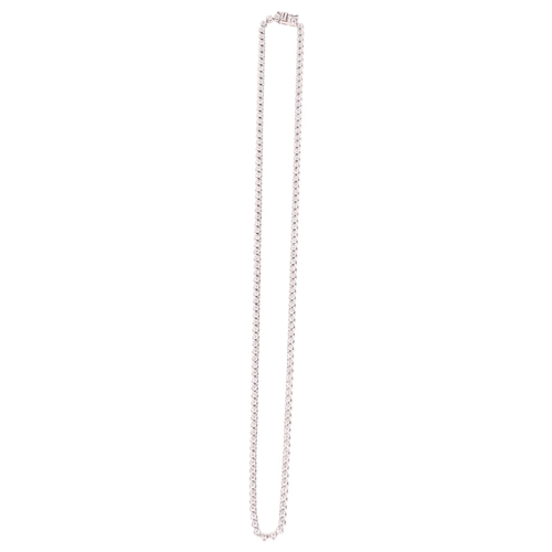 1128 - *WITHDRAWN* A 9ct white gold 5ct *lab-grown* diamond tennis line necklace, maker BFD, London 2024, s... 