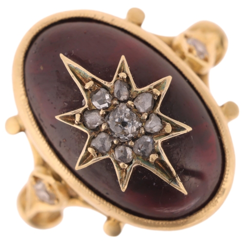 1137 - An Antique Victorian 18ct gold garnet and diamond mourning ring, the central foil-back oval cabochon... 