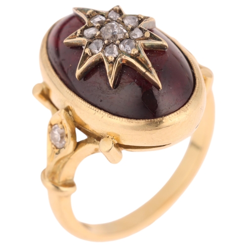 1137 - An Antique Victorian 18ct gold garnet and diamond mourning ring, the central foil-back oval cabochon... 