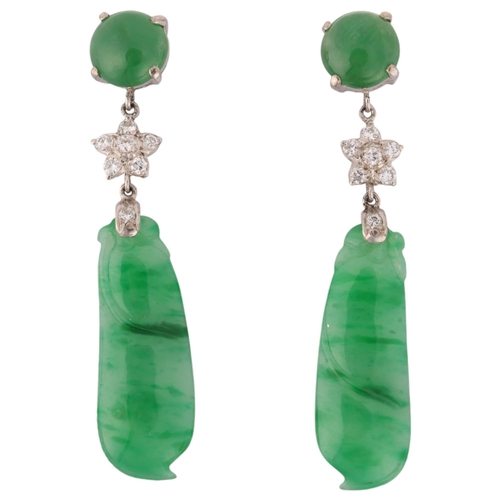 1145 - A pair of 18ct white gold jade and diamond drop stud earrings, each set with round cabochon jade sus... 