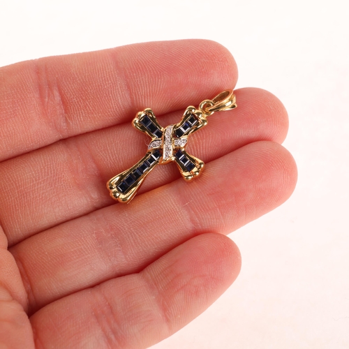 1150 - An 18ct gold sapphire and diamond cross pendant, set with calibre-cut sapphires and modern round bri... 