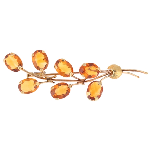 1172 - An 18ct gold citrine floral spray brooch, set with oval mixed-cut citrines, 57.5mm, 4.5g