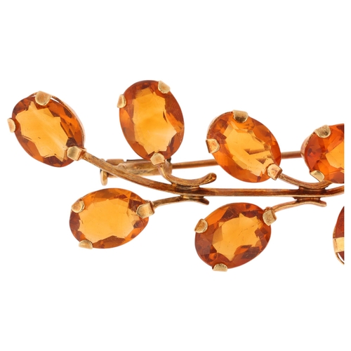 1172 - An 18ct gold citrine floral spray brooch, set with oval mixed-cut citrines, 57.5mm, 4.5g