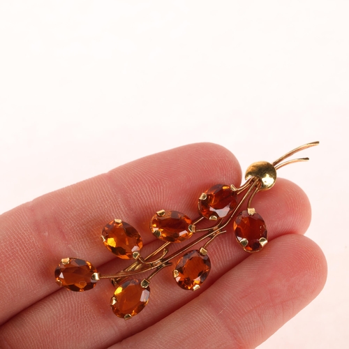 1172 - An 18ct gold citrine floral spray brooch, set with oval mixed-cut citrines, 57.5mm, 4.5g