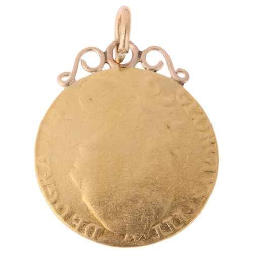 1175 - A George III 1779 gold guinea coin, with later pendant mount, 28.3mm, 8.6g