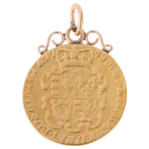 1175 - A George III 1779 gold guinea coin, with later pendant mount, 28.3mm, 8.6g