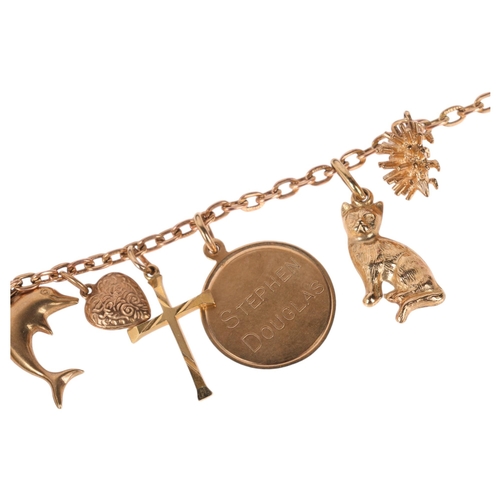 1181 - A 9ct gold cable link charm bracelet, with 14 x 9ct charms, 18cm, 16g gross