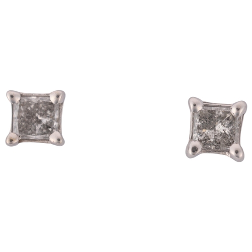 1190 - A pair of 14ct white gold 0.5ct single stone diamond stud earrings, each claw set with 0.25ct Prince... 