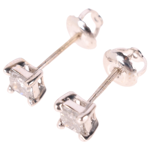 1190 - A pair of 14ct white gold 0.5ct single stone diamond stud earrings, each claw set with 0.25ct Prince... 