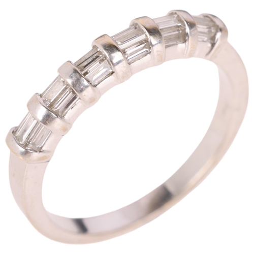 1195 - An 18ct white gold diamond half eternity ring, set with baguette-cut diamonds, total diamond content... 