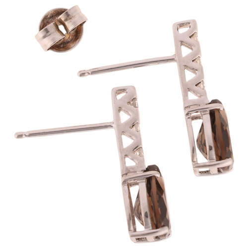 1199 - A pair of 9ct white gold smoky quartz and diamond stud earrings, set with pear-cut smoky quartz and ... 