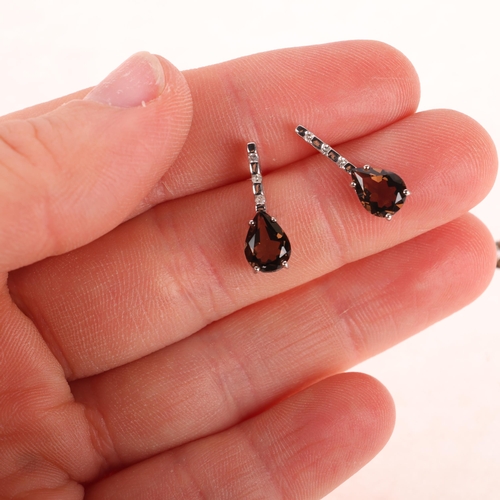 1199 - A pair of 9ct white gold smoky quartz and diamond stud earrings, set with pear-cut smoky quartz and ... 